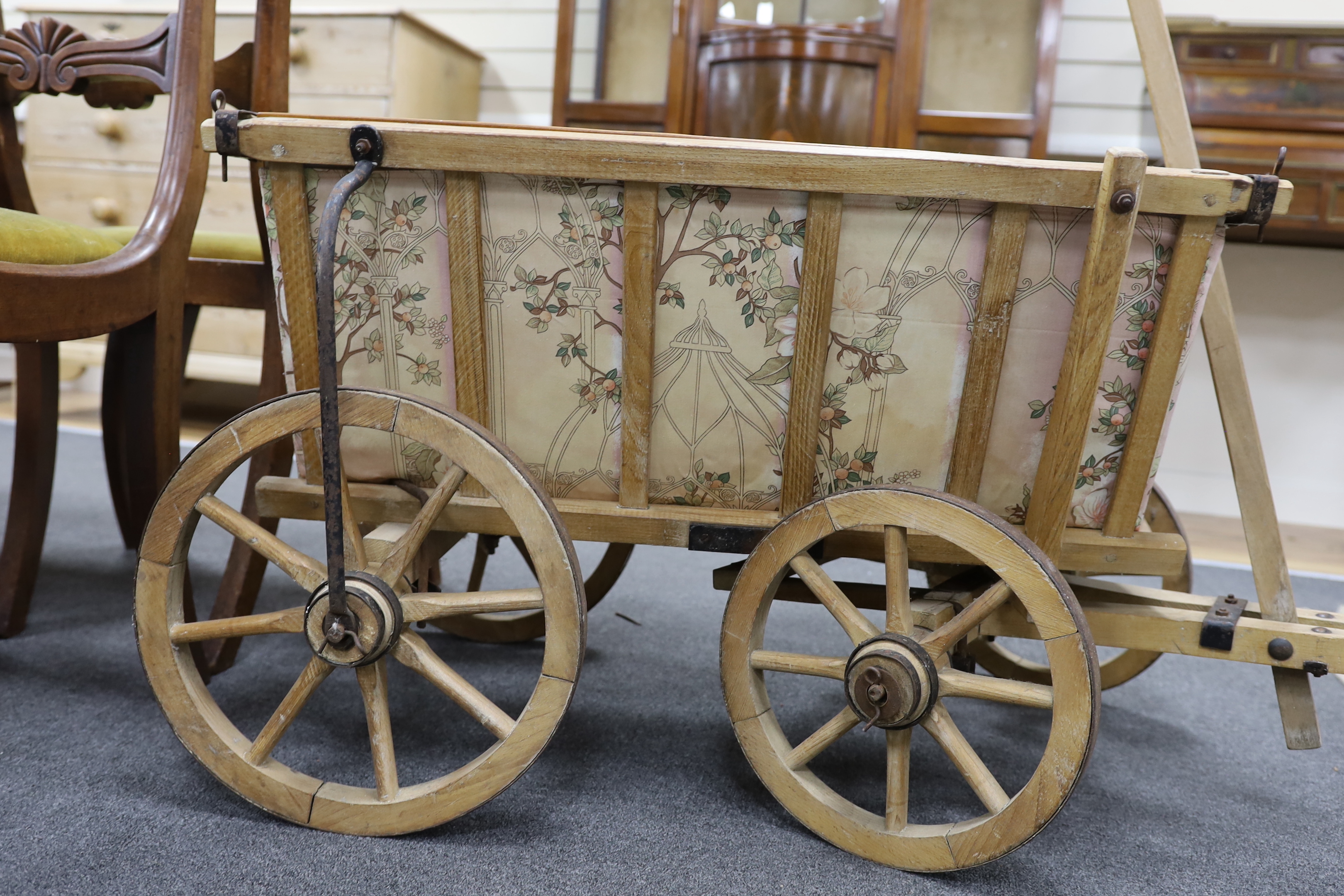 A vintage oak dog cart with later liner, length 78cm, depth 55cm, height 55cm